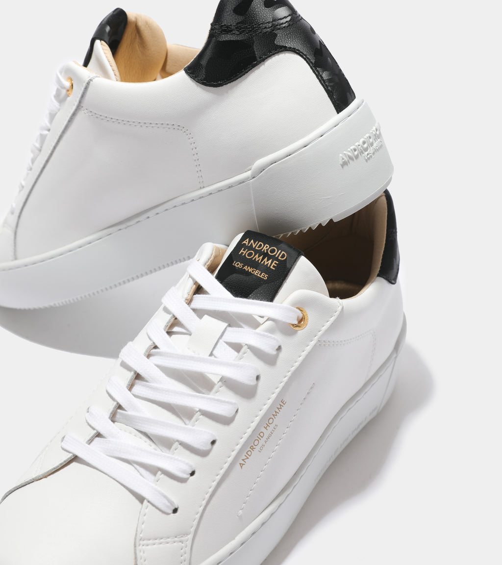 Detailed ecom imagery of the Zuma White Black Leather Camo Android Homme Trainers.