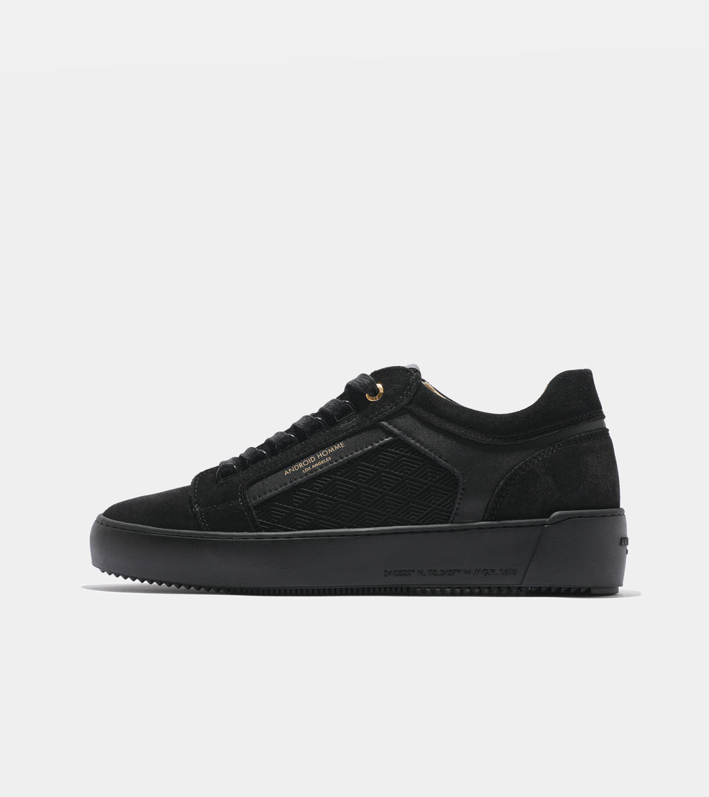 Detailed ecom imagery of the Venice Black Rubber Tipnet Android Homme Trainers with patterns.