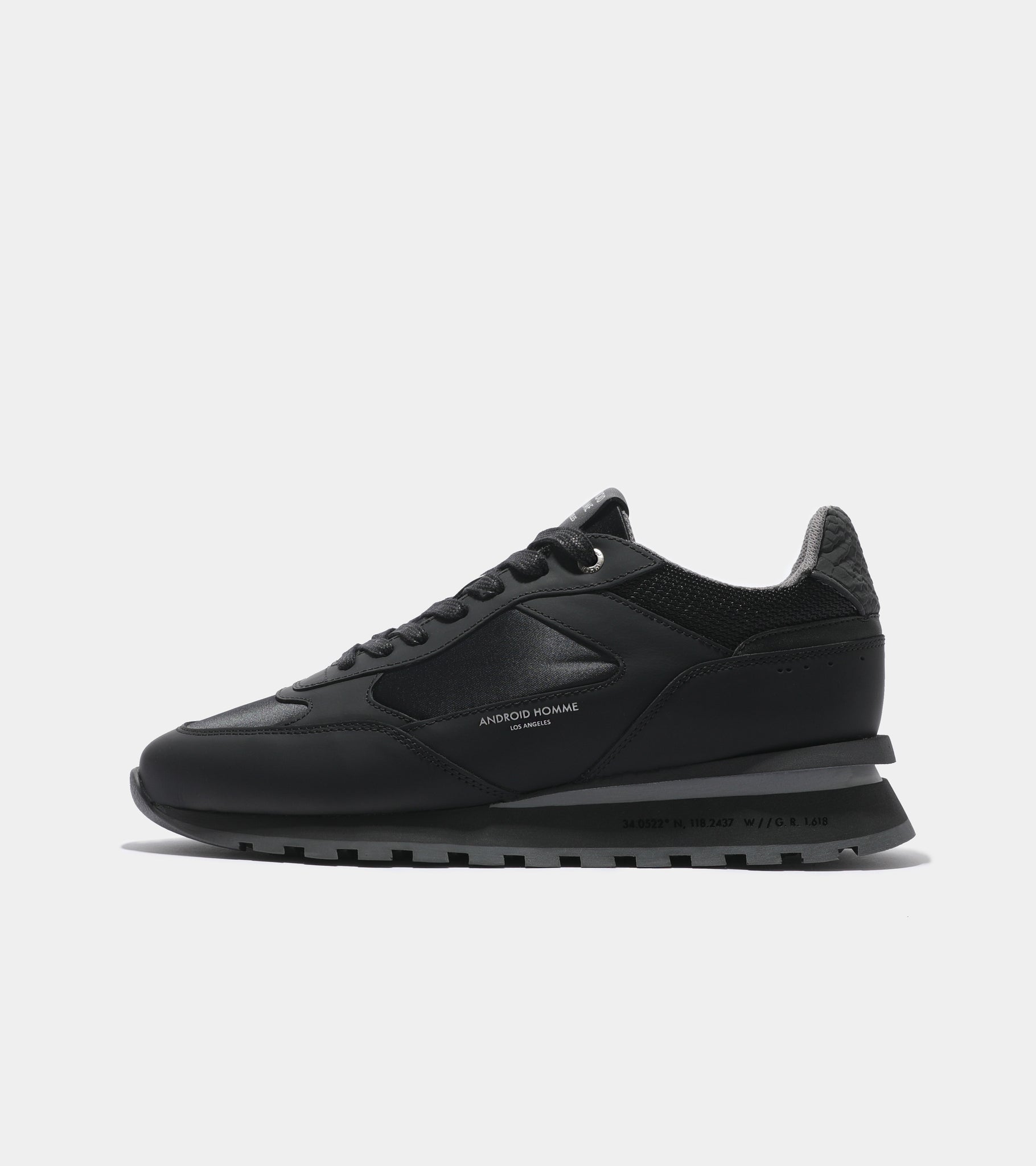 Ecom imagery of the Lechuza Racer Black Gomma Reflective Python Android Homme Trainers.
