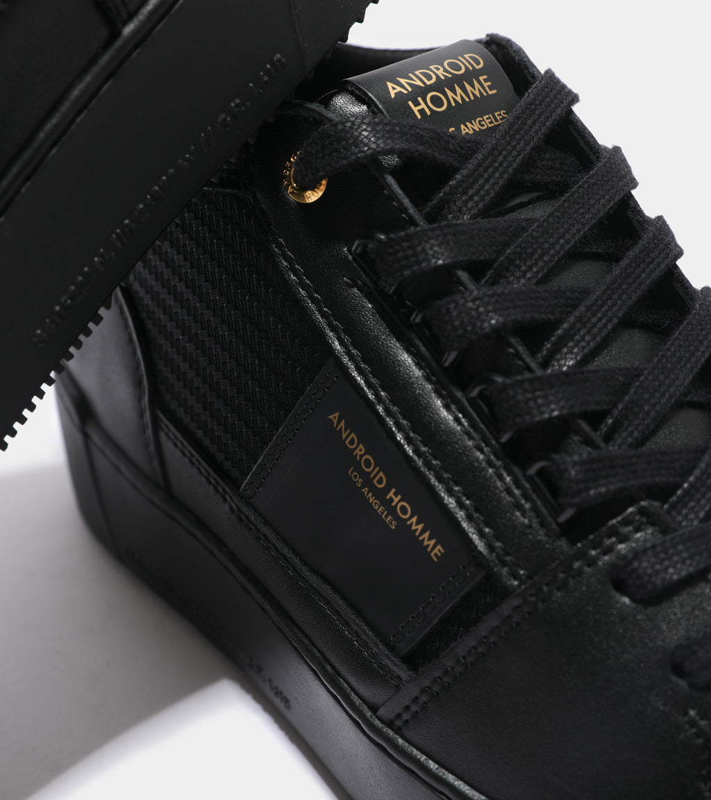 Close up image of a Android Homme Point Dume Trainer in a Black Carbon Fibre Leather.