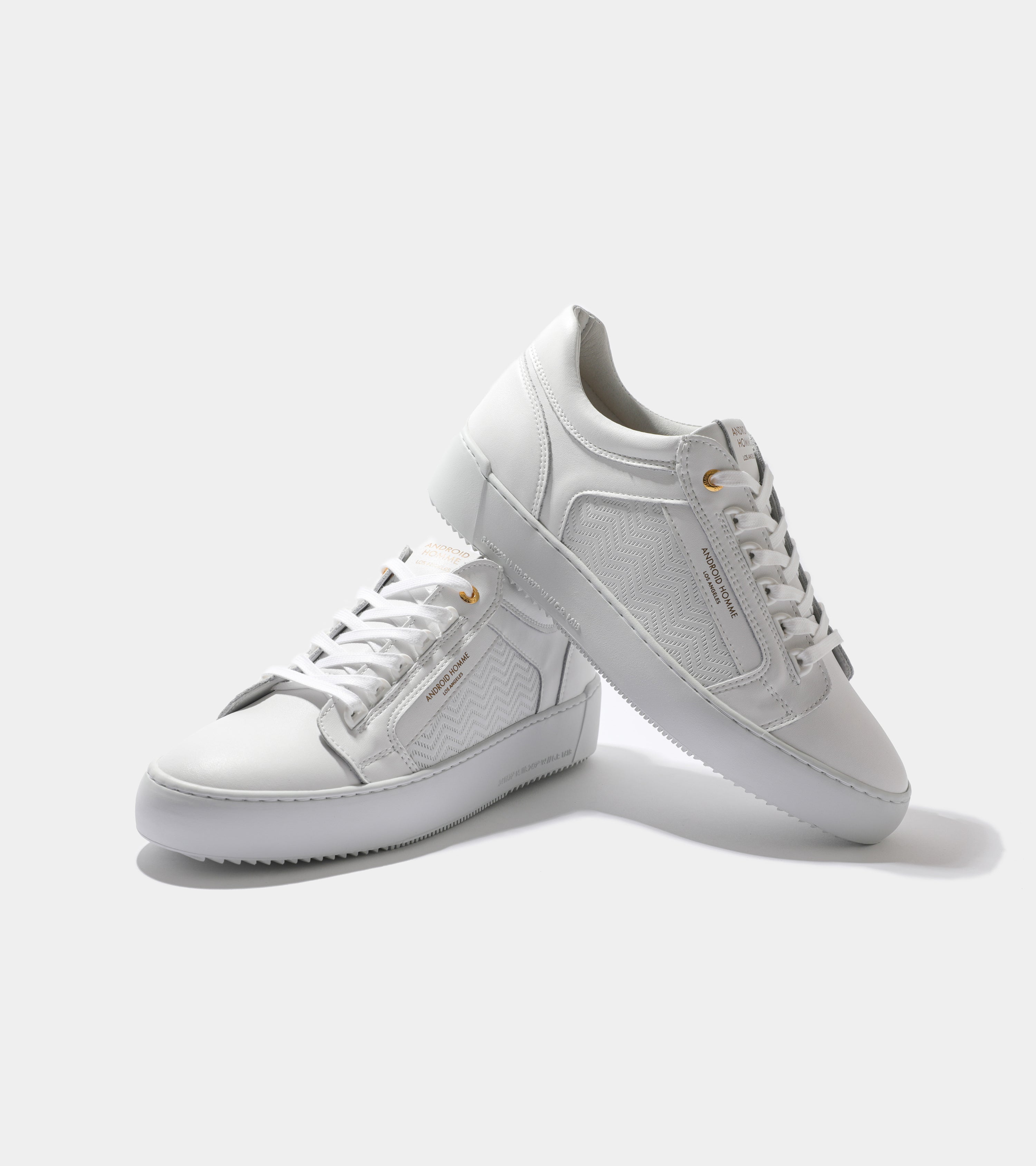 Ecom imagery of the Venice White Emboss Leather Android Homme Trainers.