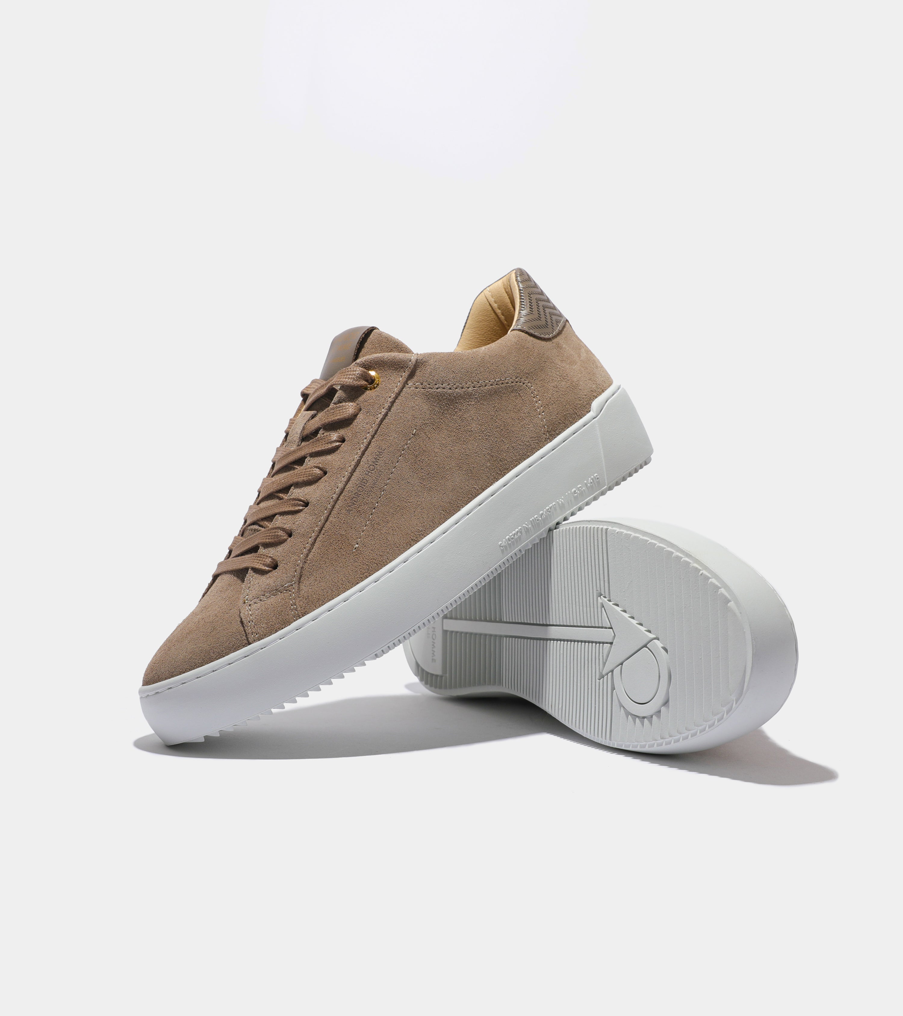 Ecom imagery of the Zuma Taupe Suede Zig Zag Leather Android Homme Trainers.