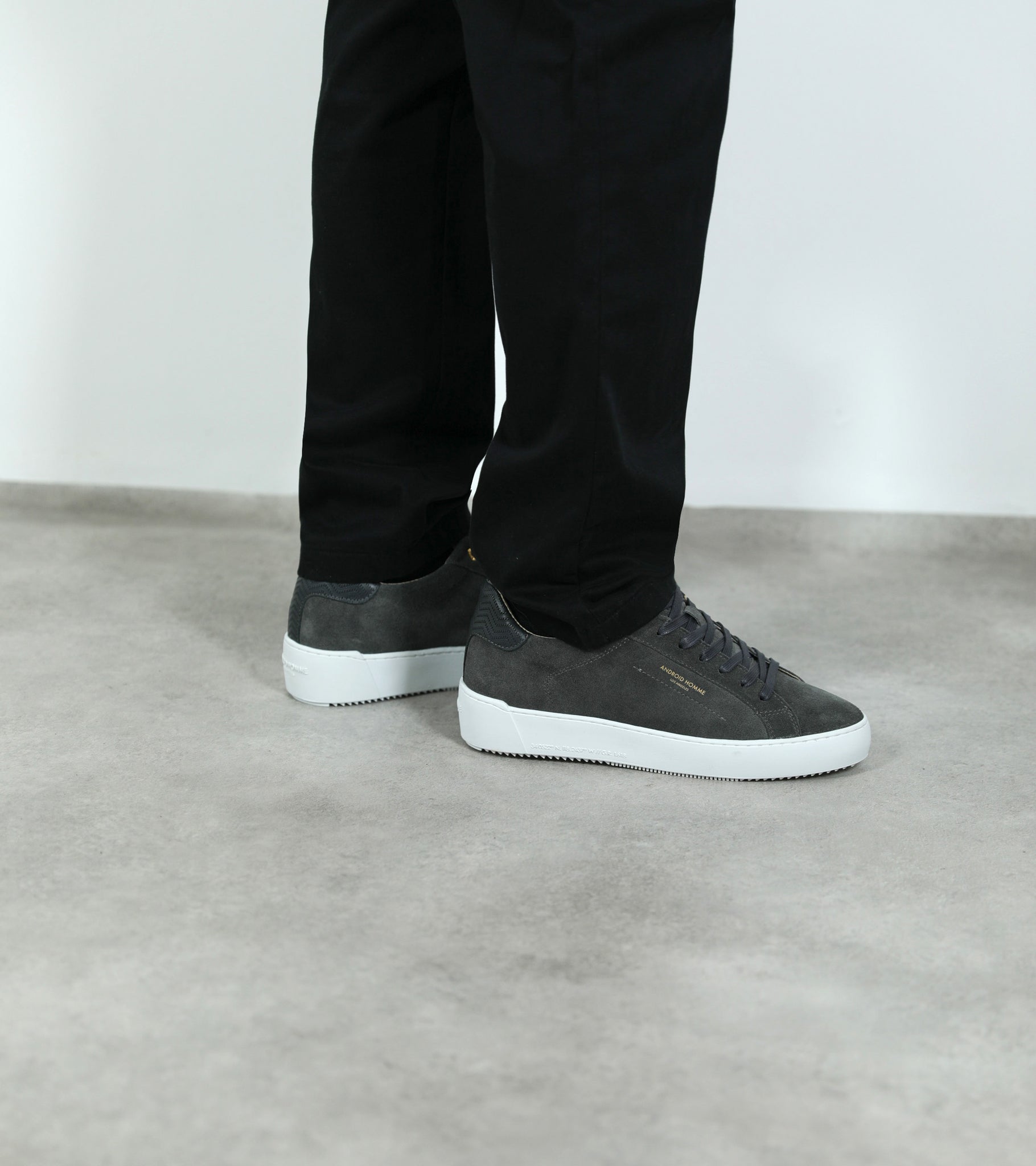 Ecom imagery of the Zuma Grey Suede Zig Zag Leather Android Homme Trainers on foot.